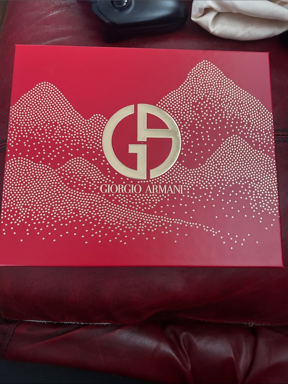 Giorgio Armani Red Box with Gold Logo and Dot Motif